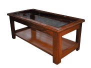 A wooden table with a glass top and a shelf