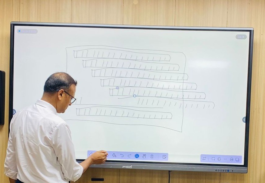 Teacher Using interactive Whiteboard on Interactive Panel Display
