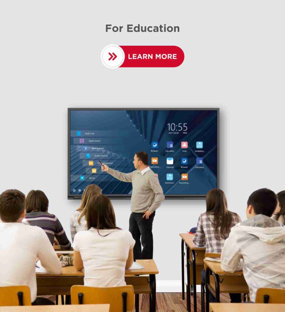 Teacher teaching in classroom using interactive flat panel display