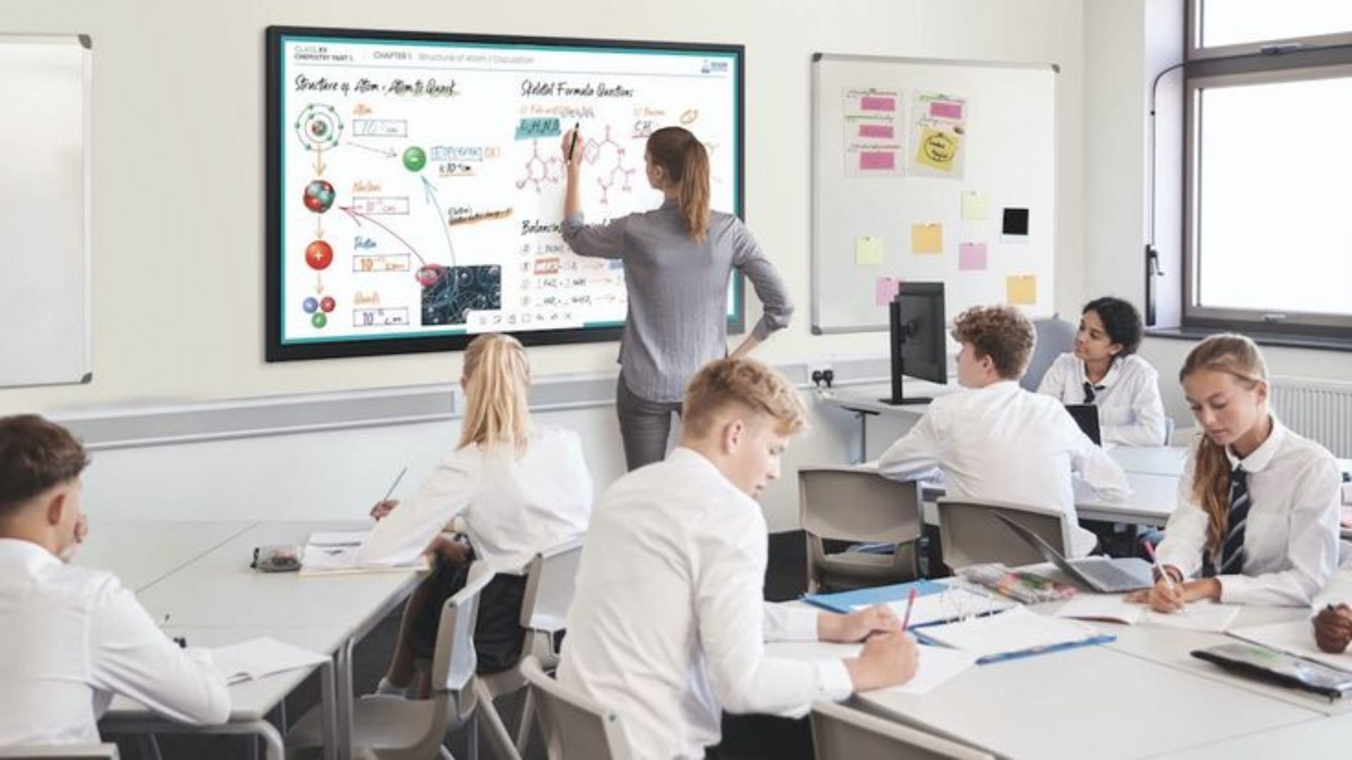 Teacher Teach a student on Smart Board