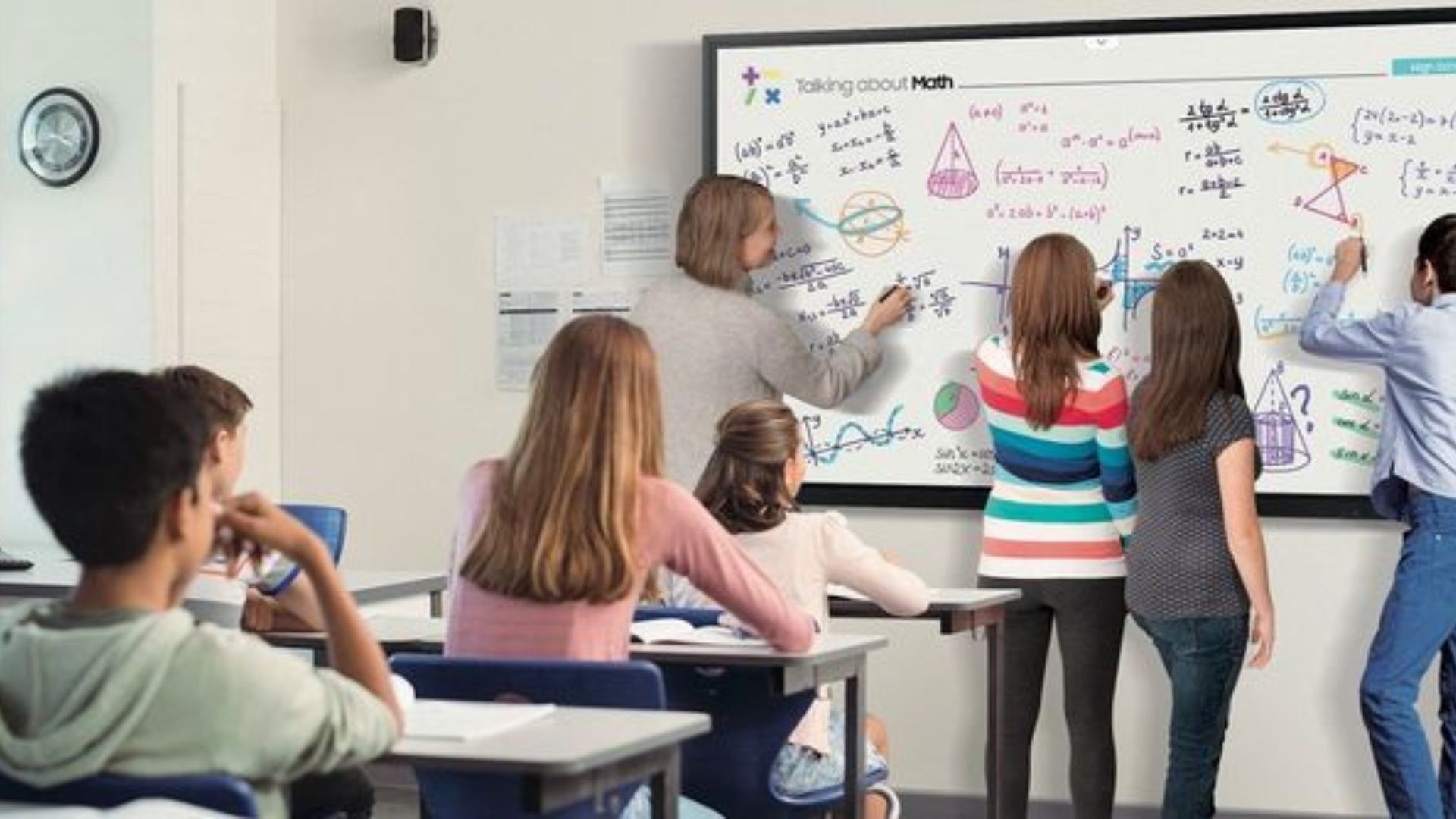 Teacher Teach a Students on Interactive whiteboard in classroom
