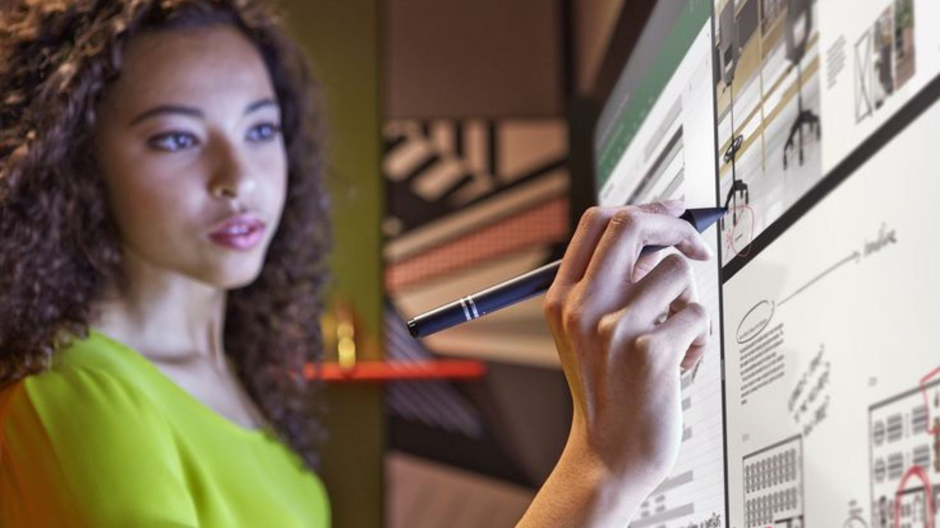girl use smart pen on interactive flat panel display