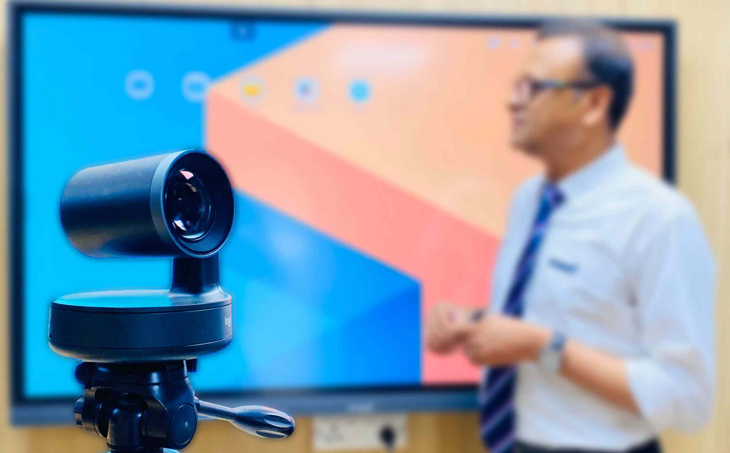 Teacher using a PTZ Camera in classroom